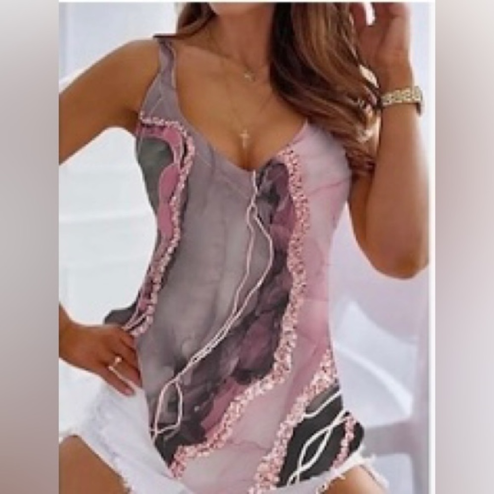 NWT WOMENS SZ SM V NECK TANK TOP STILL IN PACKAGE IDENTICAL TO TOP
PHOTO